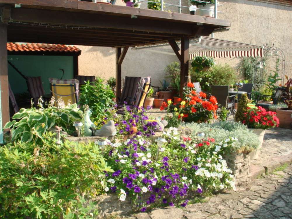 Überdachte Gemeinschaftsterrasse Überdachte Gemeinschaftsterrasse